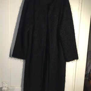 Look and feel of mohair. Light weight coat.